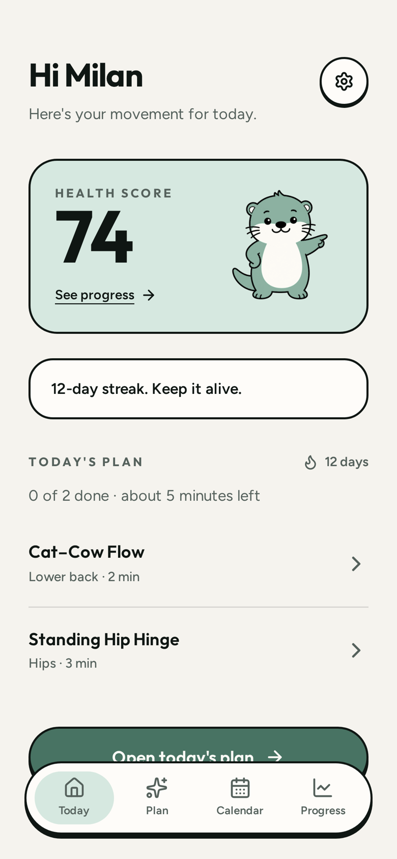 The Moca app home screen: a health score of 74, a 12-day streak and today's plan with Cat-Cow Flow and Standing Hip Hinge.